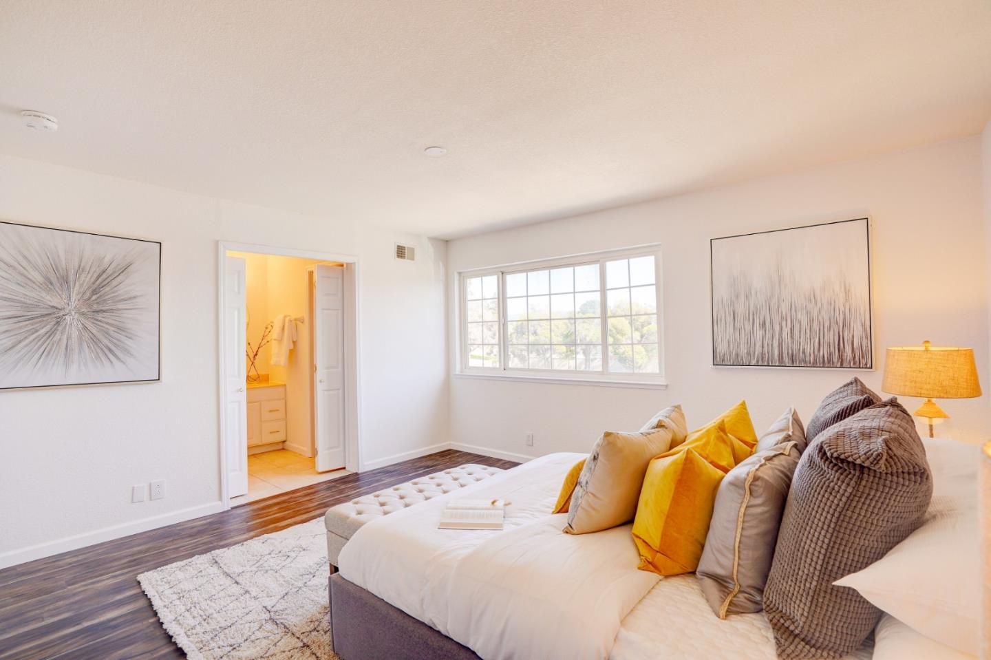 2945 Berryessa Road San Jose, CA 95132 - Photo 23 of 49 a bedroom with a bed and wooden floor