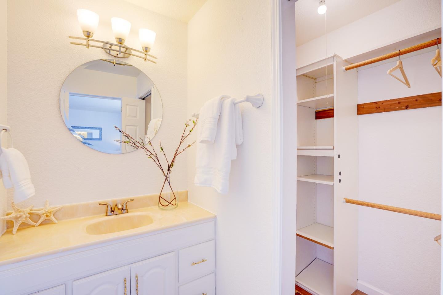 2945 Berryessa Road San Jose, CA 95132 - Photo 25 of 49 a bathroom with a sink and a mirror