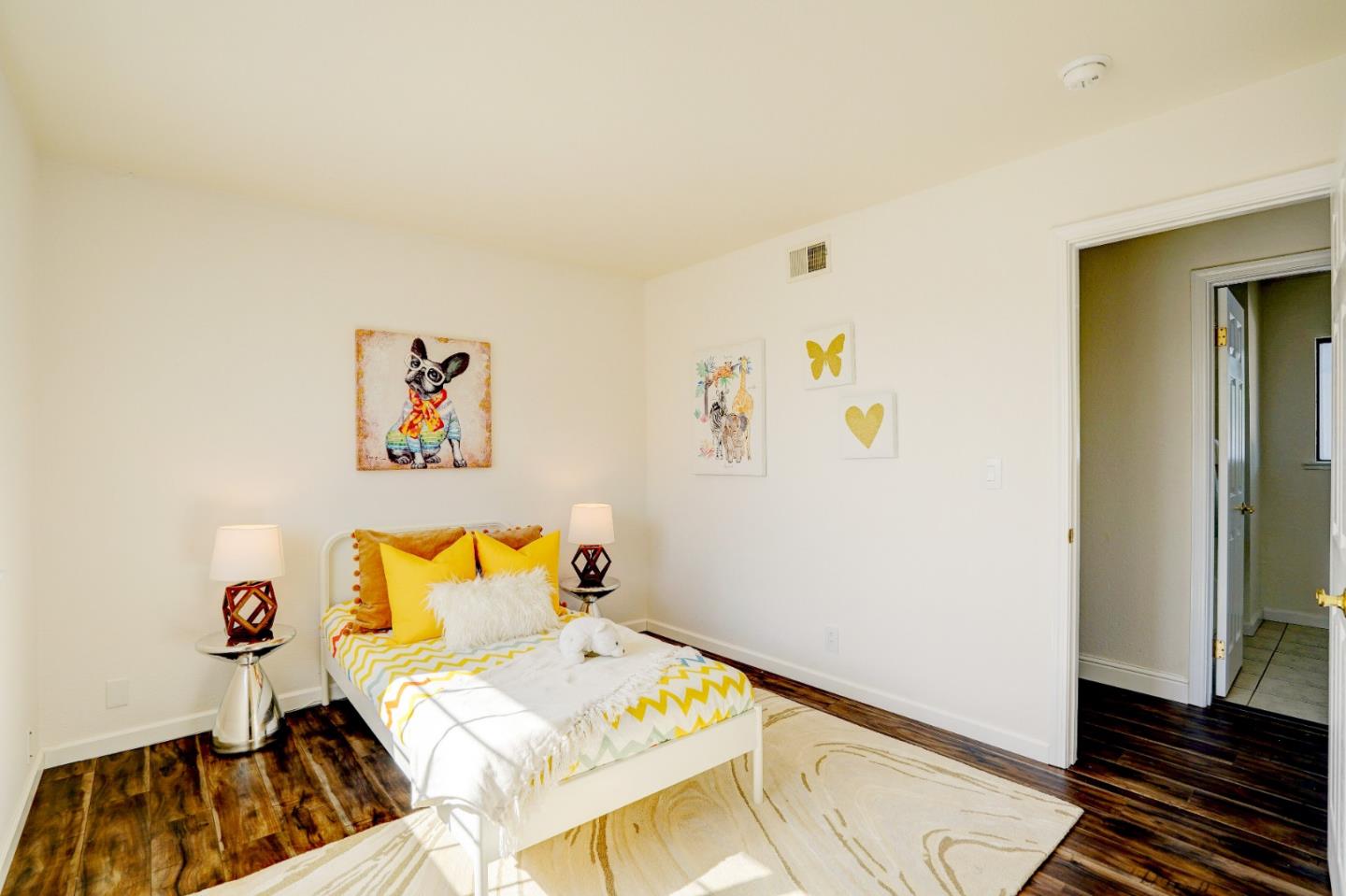 2945 Berryessa Road San Jose, CA 95132 - Photo 26 of 49 a bedroom with a bed and wooden floor