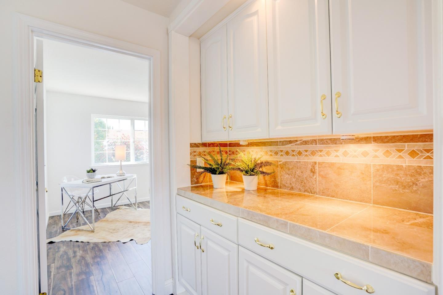 2945 Berryessa Road San Jose, CA 95132 - Photo 31 of 49 a bathroom with a sink and a mirror