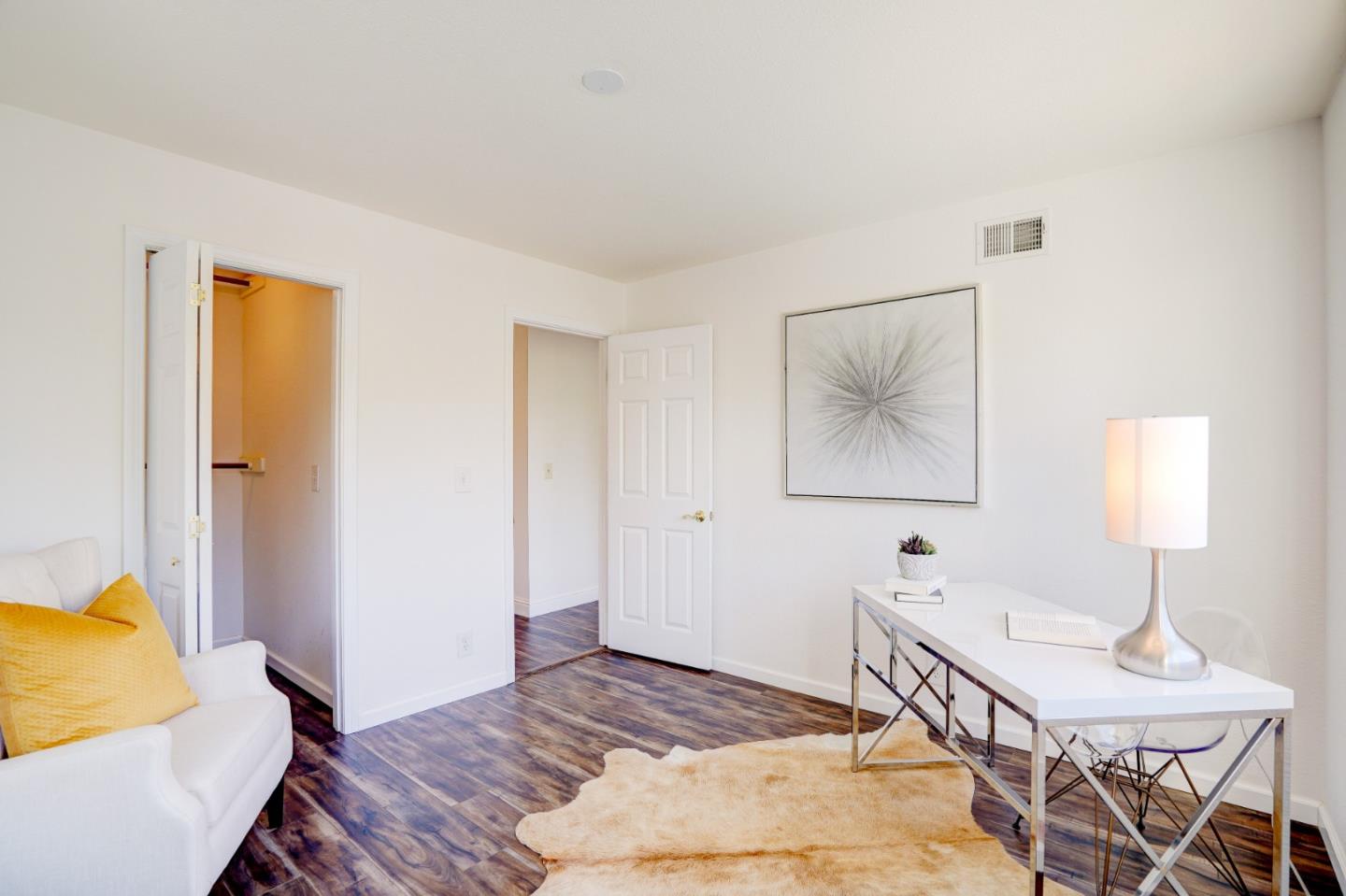 2945 Berryessa Road San Jose, CA 95132 - Photo 34 of 49 a bedroom with a bed and a table in it