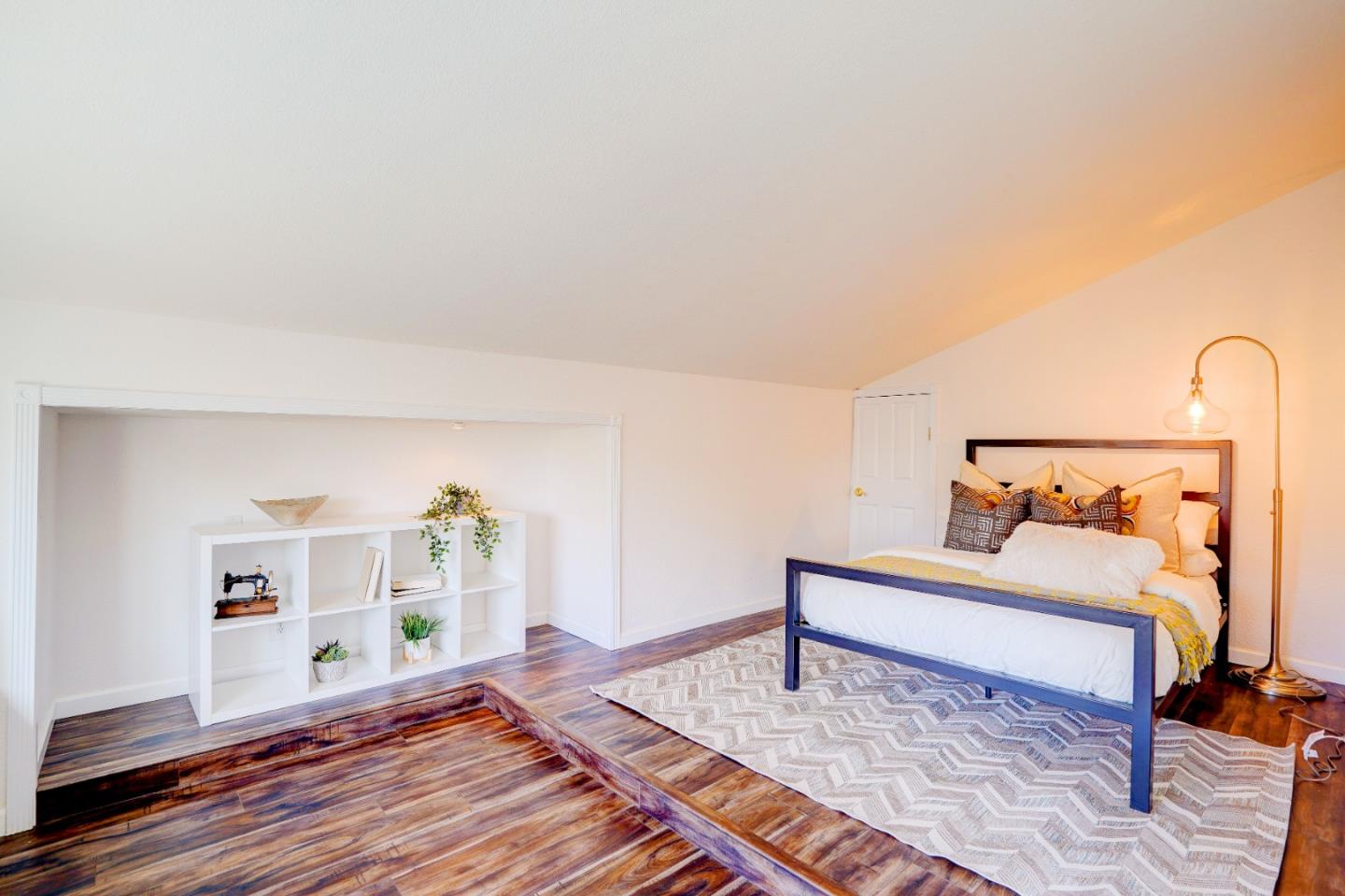 2945 Berryessa Road San Jose, CA 95132 - Photo 35 of 49 a room with a bed and a wooden floor