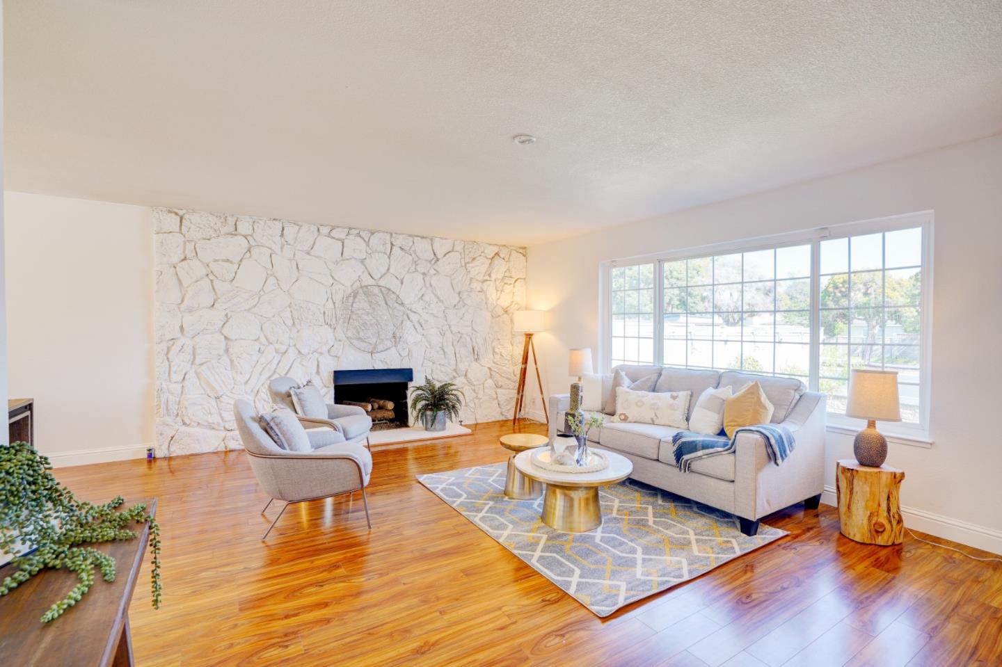 2945 Berryessa Road San Jose, CA 95132 - Photo 6 of 49 a living room with fireplace furniture and a large window