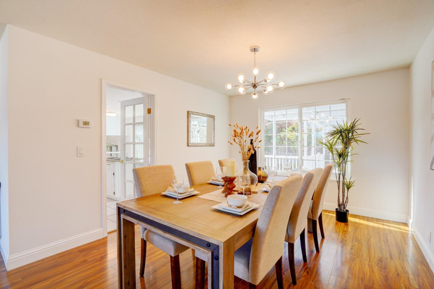 2945 Berryessa Road San Jose, CA 95132 - Photo 9 of 49 a view of a dining room with furniture and wooden floor