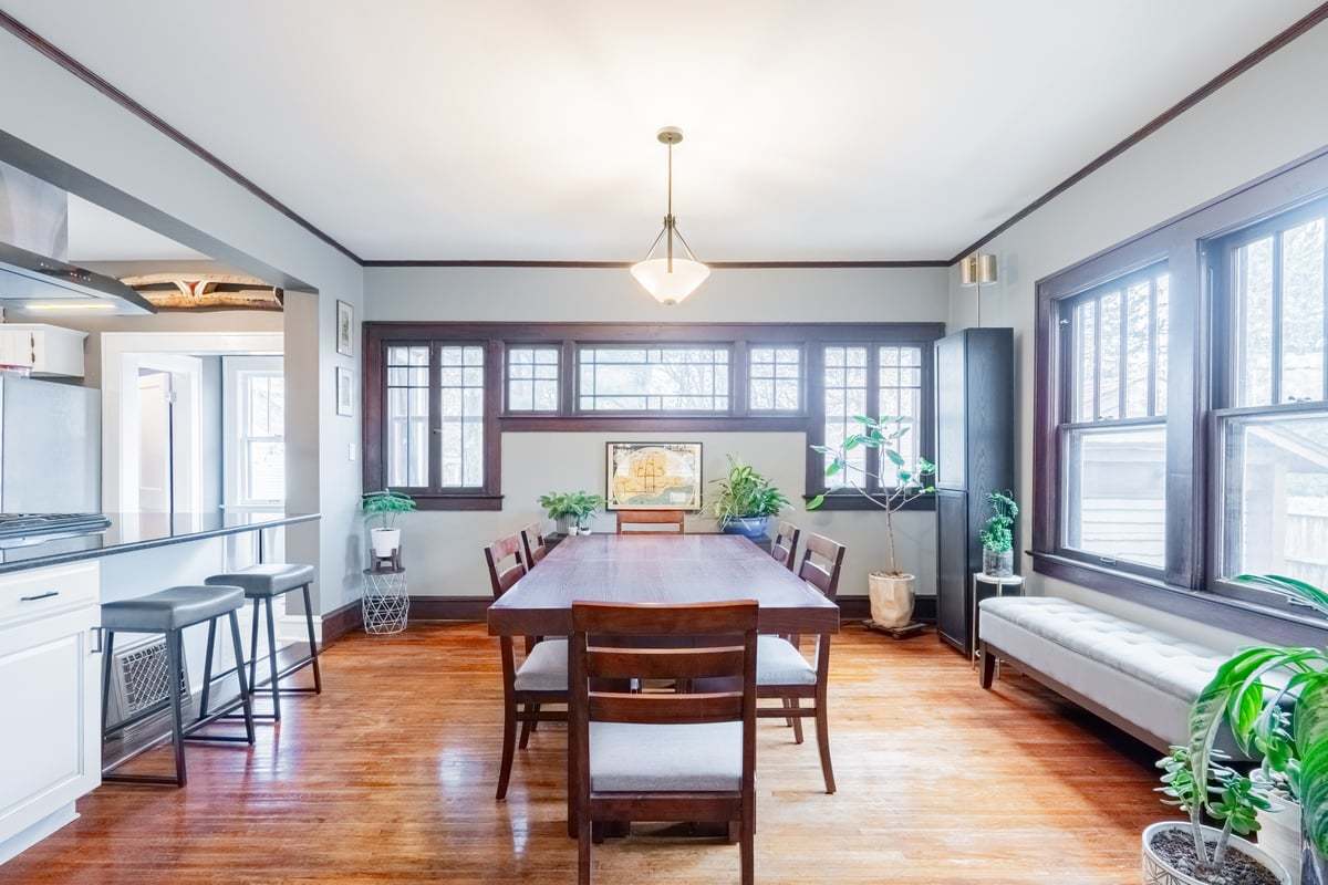 412 West Virginia Avenue Normal, IL 61761 - Photo 12 of 42 a dining room with furniture a chandelier and wooden floor