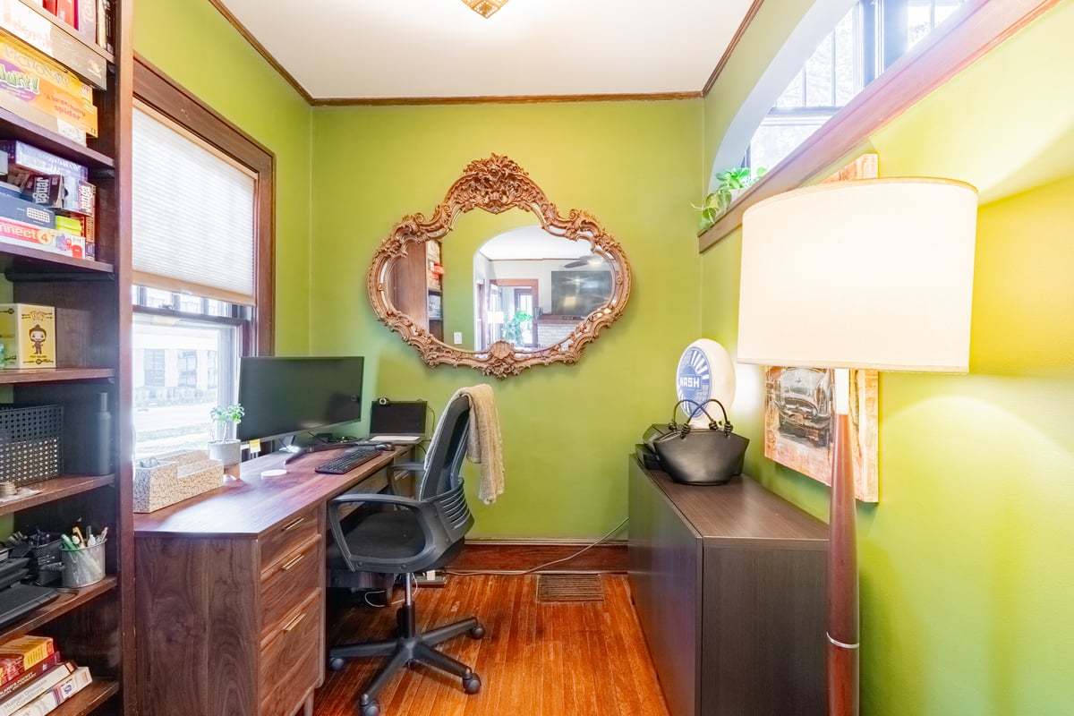 412 West Virginia Avenue Normal, IL 61761 - Photo 19 of 42 a workspace with furniture and a mirror