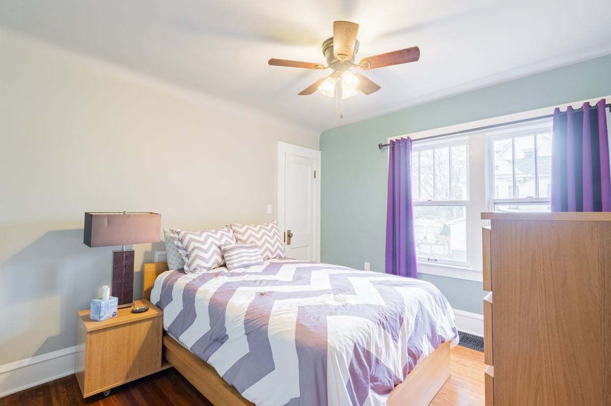 412 West Virginia Avenue Normal, IL 61761 - Photo 20 of 42 a bedroom with a bed and a large window