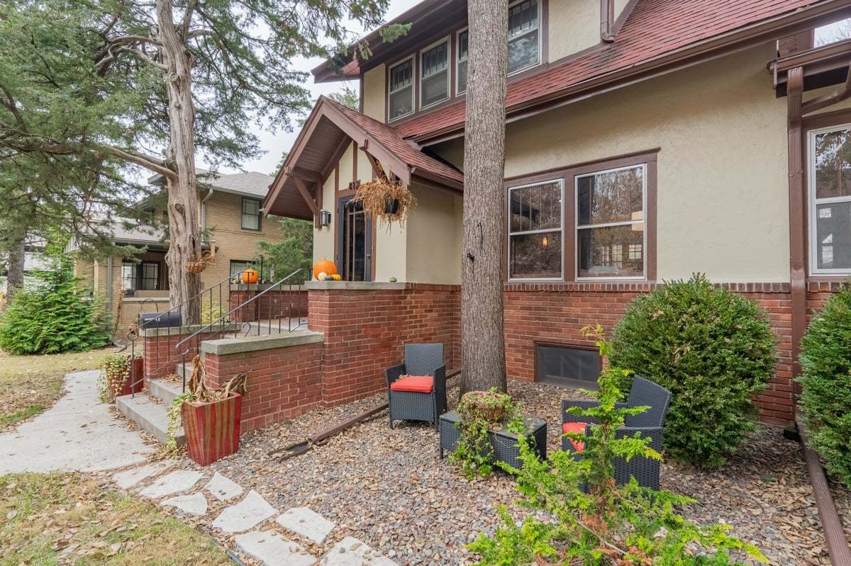 412 West Virginia Avenue Normal, IL 61761 - Photo 2 of 42 a view of a brick house with many windows
