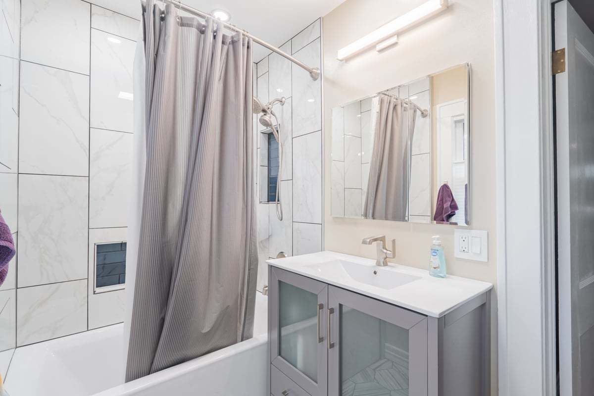 412 West Virginia Avenue Normal, IL 61761 - Photo 22 of 42 a bathroom with a sink and a mirror