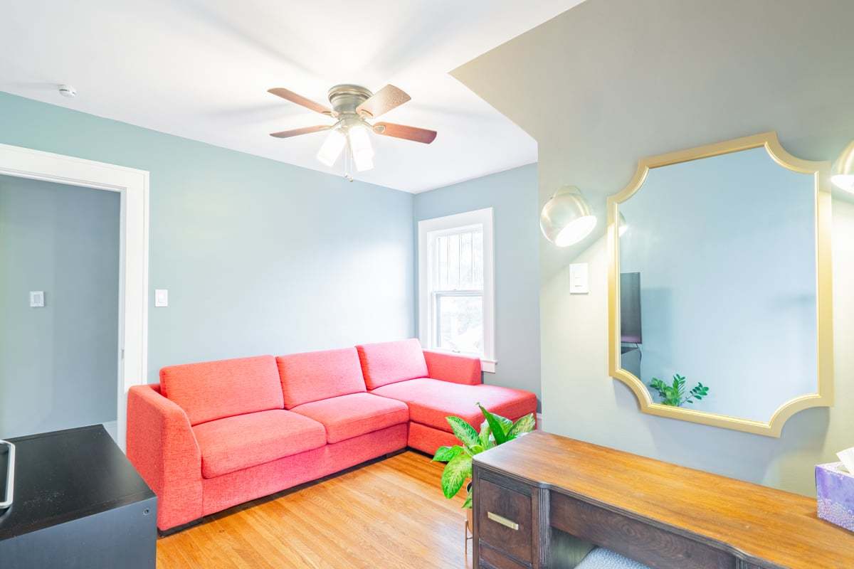 412 West Virginia Avenue Normal, IL 61761 - Photo 26 of 42 a living room with furniture and a wooden floor
