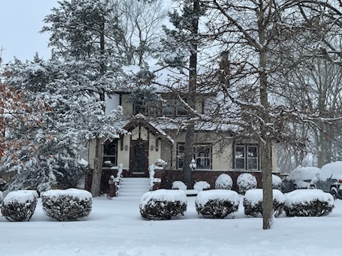 412 West Virginia Avenue Normal, IL 61761 - Photo 35 of 42 a group of cars parked in front of a house