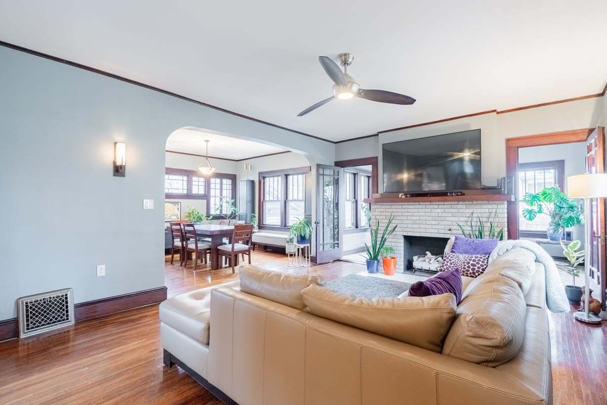 412 West Virginia Avenue Normal, IL 61761 - Photo 8 of 42 a living room with furniture fireplace and a flat screen tv