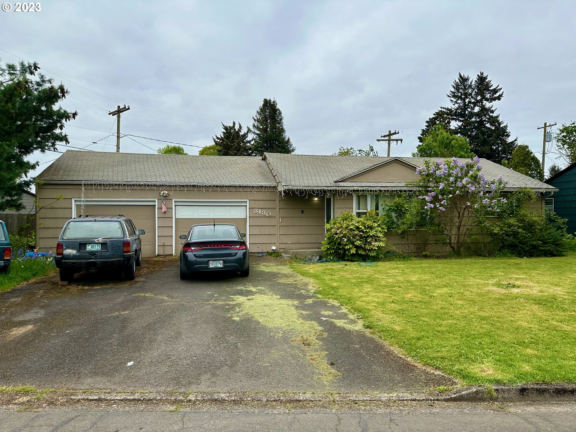 3130 Partridge Way Springfield, OR 97477 - Photo 2 of 14 a car parked in front of a house