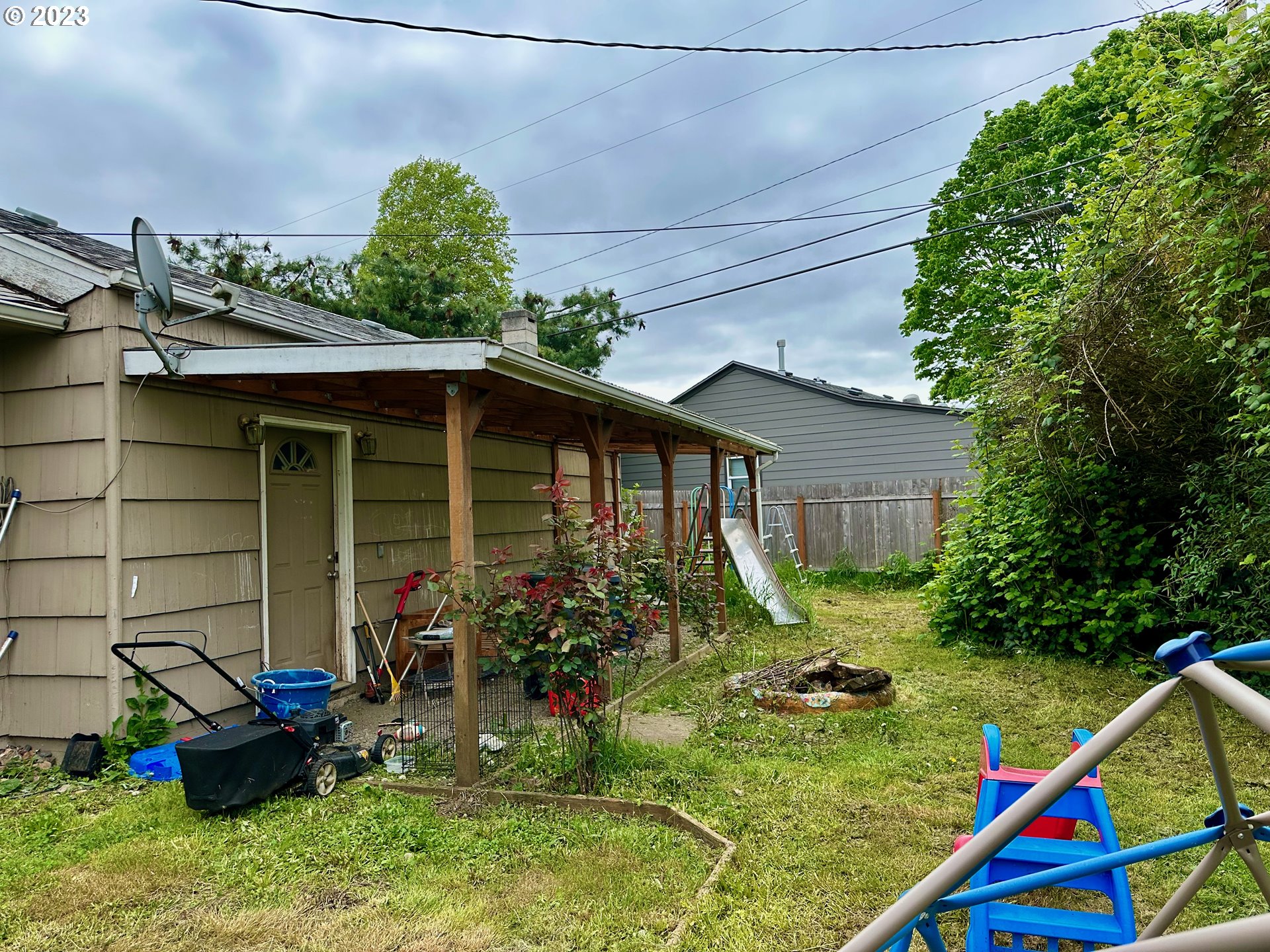 3130 Partridge Way Springfield, OR 97477 - Photo 5 of 14 a backyard of a house with seating space