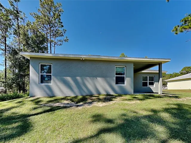 a front view of house with yard