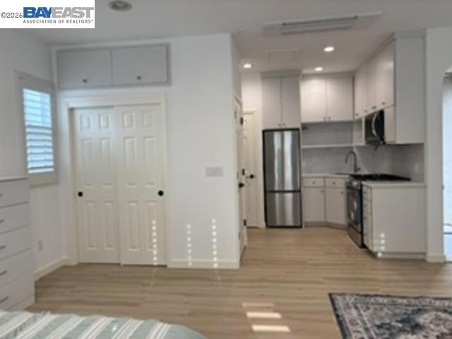 Undisclosed Address San Ramon, CA 94582 - Photo 3 of 15 a kitchen with stainless steel appliances granite countertop a refrigerator and a sink