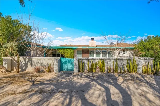 a view of a house with a swimming pool