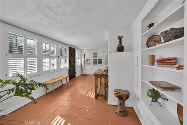 a room with furniture and a window