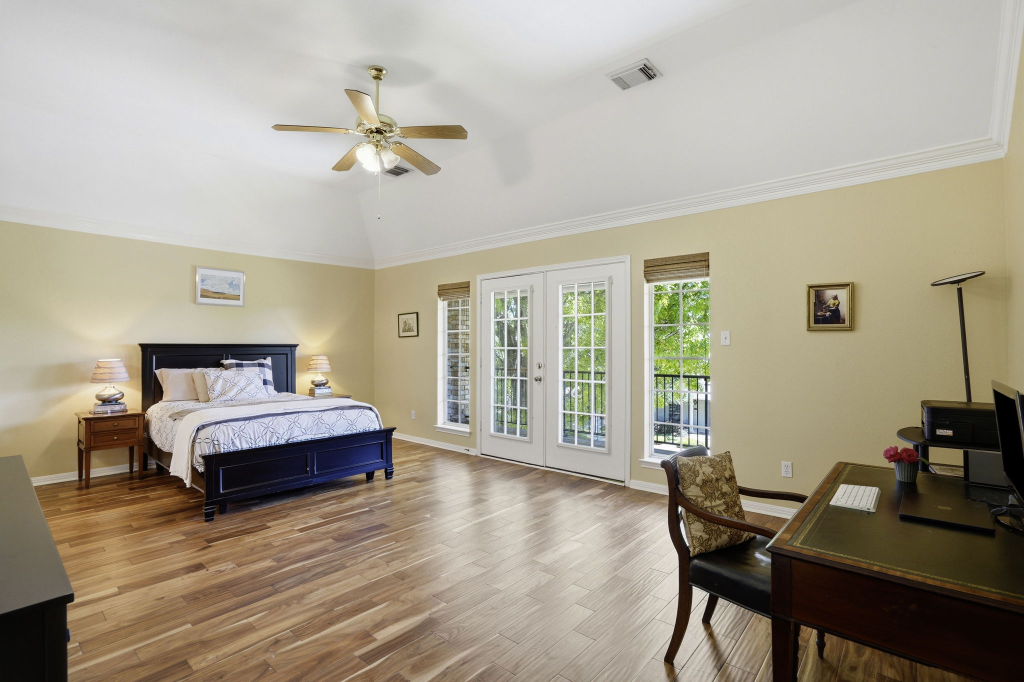 9113 Evening Primrose Path Austin, TX 78750 - Photo 17 of 34 a spacious bedroom with a bed and a window
