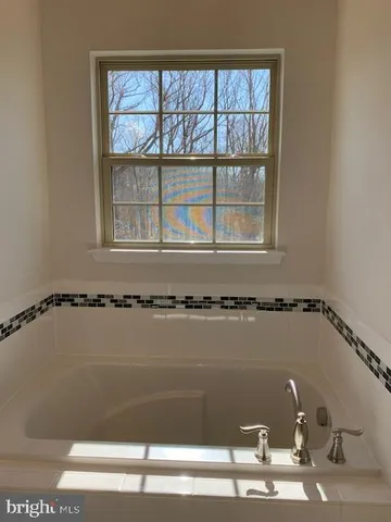 a picture of a room with a window