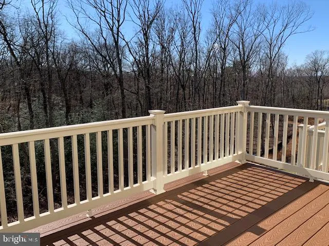 a view of a wooden roof deck