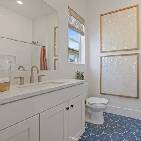 a bathroom with a sink and a toilet
