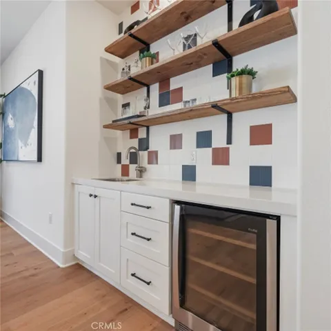 a kitchen with a cabinets and window