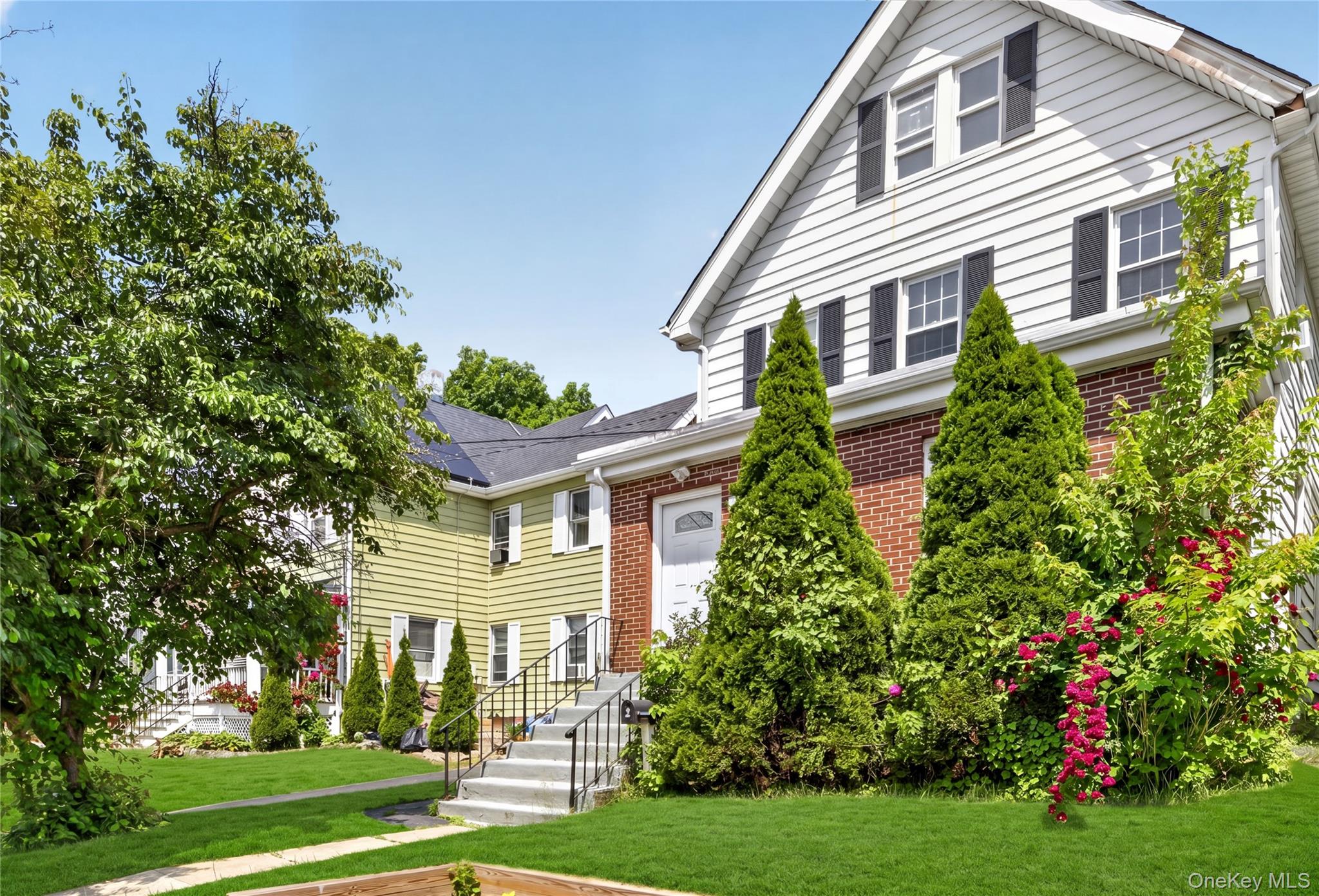 239 Fremont Street Peekskill, NY 10566 - Photo 3 of 43 Manicured lawn