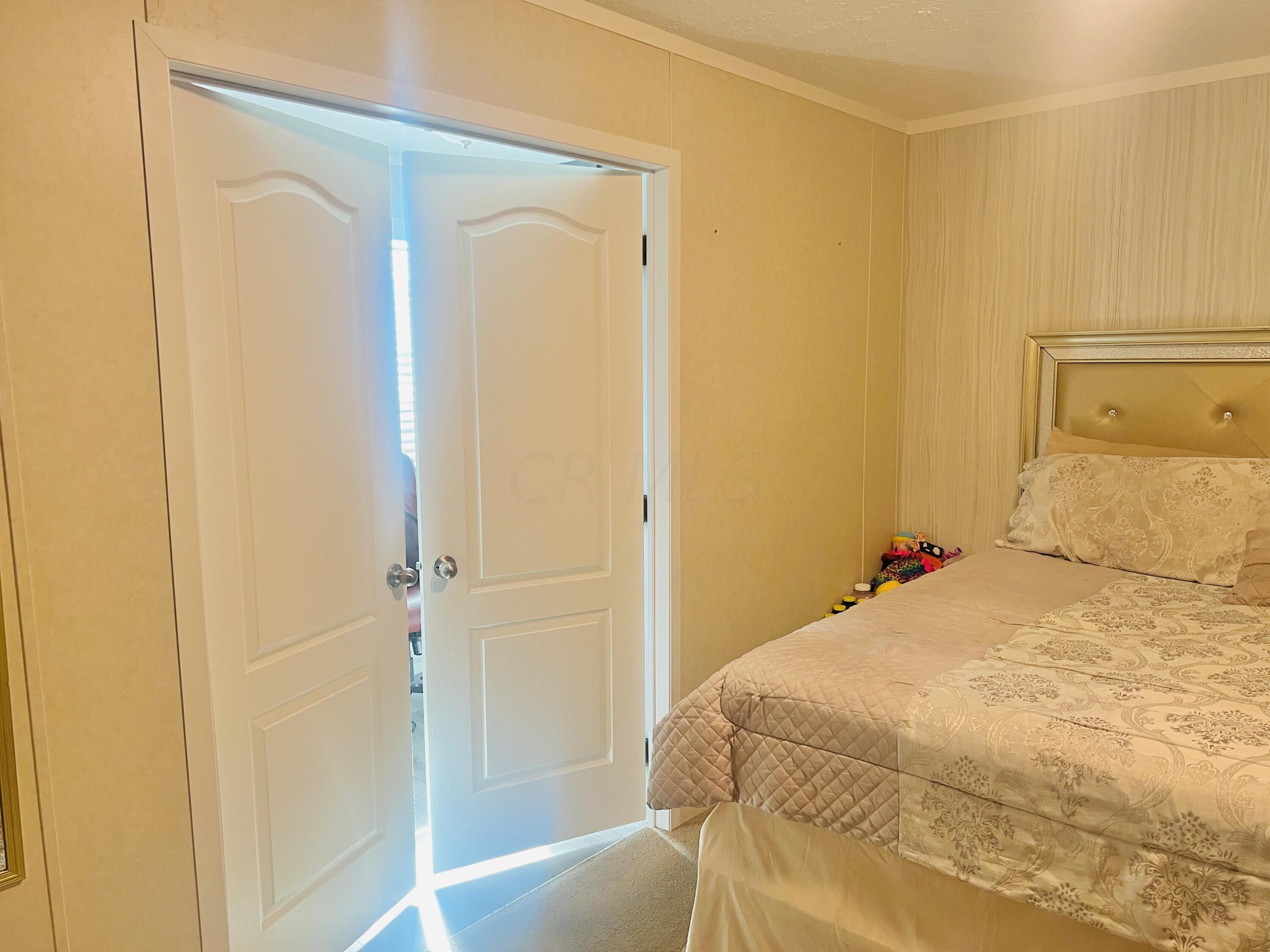 3 Ravine Ridge Drive Delaware, OH 43015 - Photo 13 of 24 French Door to Bathroom