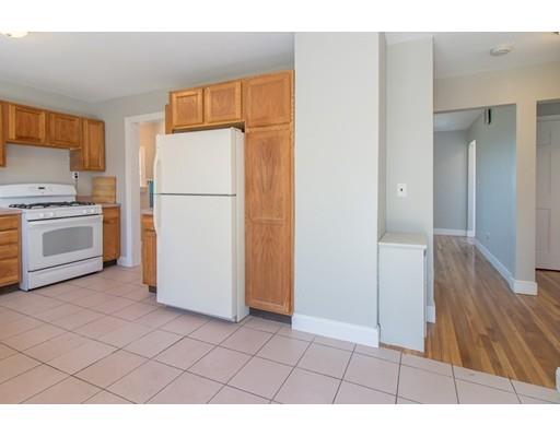 161 Nantasket Road Hull, MA 02045 - Photo 11 of 26 a utility room with cabinets washer and dryer