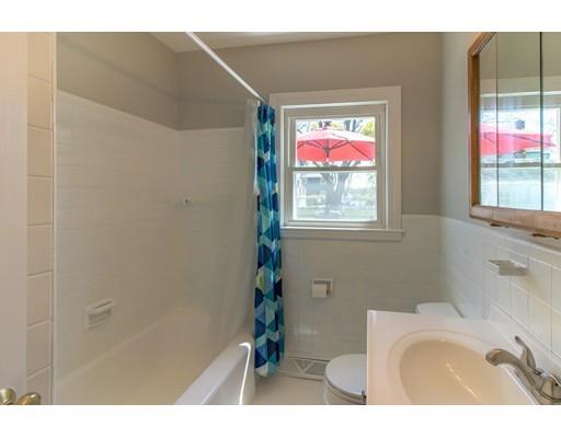 161 Nantasket Road Hull, MA 02045 - Photo 14 of 26 a bathroom with a sink and a mirror