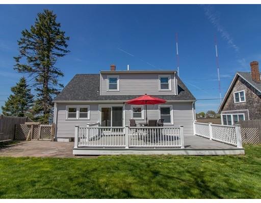 161 Nantasket Road Hull, MA 02045 - Photo 4 of 26 a front view of a house with a yard