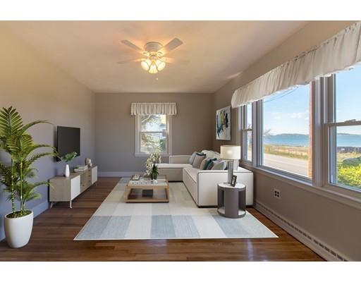 161 Nantasket Road Hull, MA 02045 - Photo 5 of 26 a living room with furniture a chandelier and a window