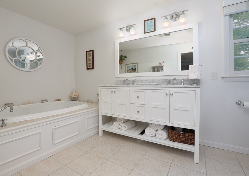 139 Morgan Road Northbridge, MA 01588 - Photo 13 of 22 a spacious bathroom with a double vanity sink and a mirror