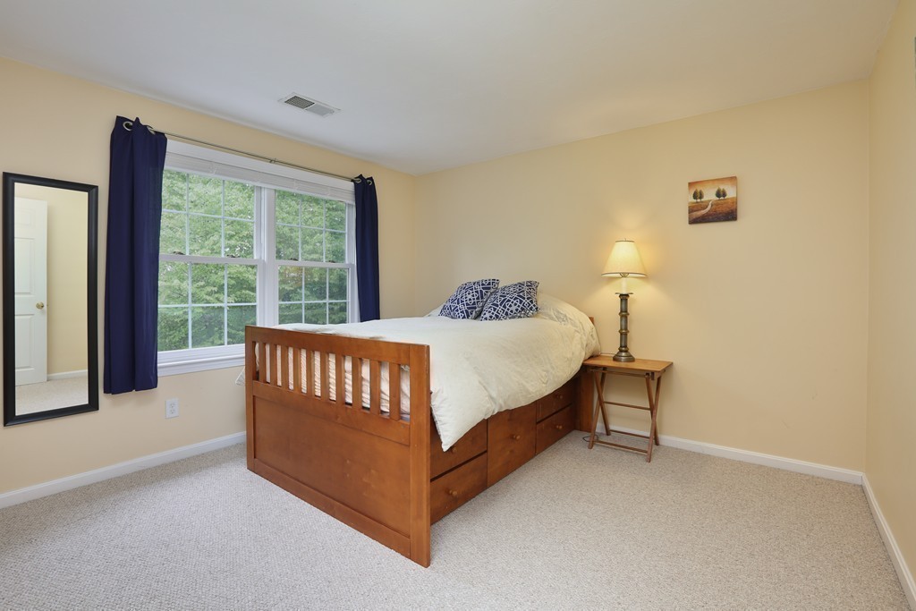 139 Morgan Road Northbridge, MA 01588 - Photo 14 of 22 a bedroom with a bed and a large window