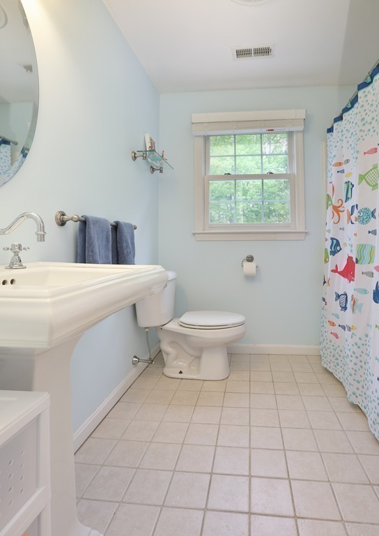 139 Morgan Road Northbridge, MA 01588 - Photo 17 of 22 a bathroom with a sink toilet and a mirror