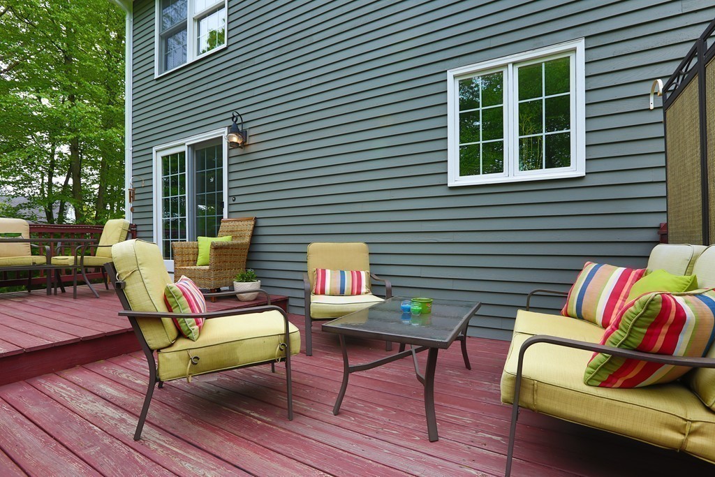 139 Morgan Road Northbridge, MA 01588 - Photo 18 of 22 a view of a deck with couches chairs and wooden floor