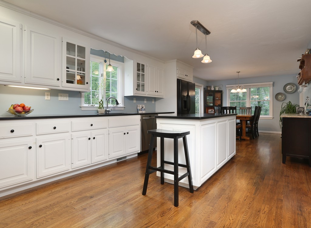 139 Morgan Road Northbridge, MA 01588 - Photo 4 of 22 a kitchen with white cabinets and sink