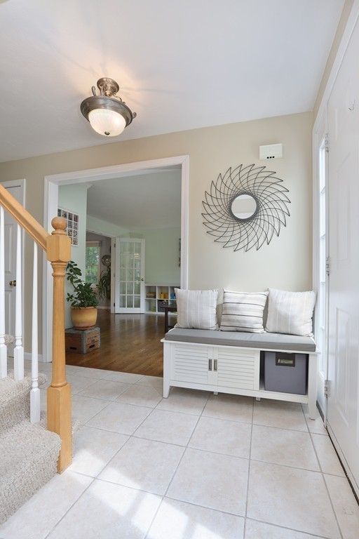 139 Morgan Road Northbridge, MA 01588 - Photo 7 of 22 a living room with a table and chairs