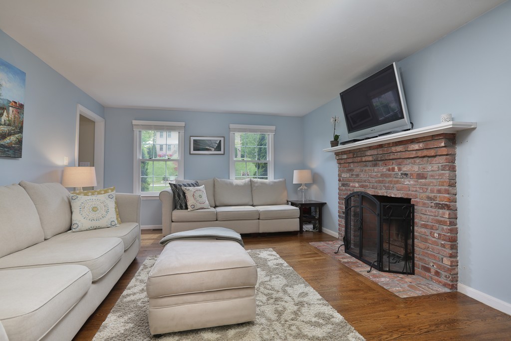 139 Morgan Road Northbridge, MA 01588 - Photo 8 of 22 a living room with furniture and a fireplace