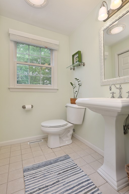 139 Morgan Road Northbridge, MA 01588 - Photo 9 of 22 a bathroom with a sink toilet and a window