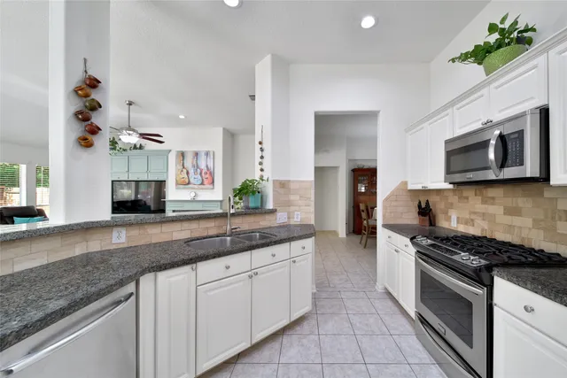 $410,000 | 67 North Veranda Ridge Drive, The Woodlands, TX 77382