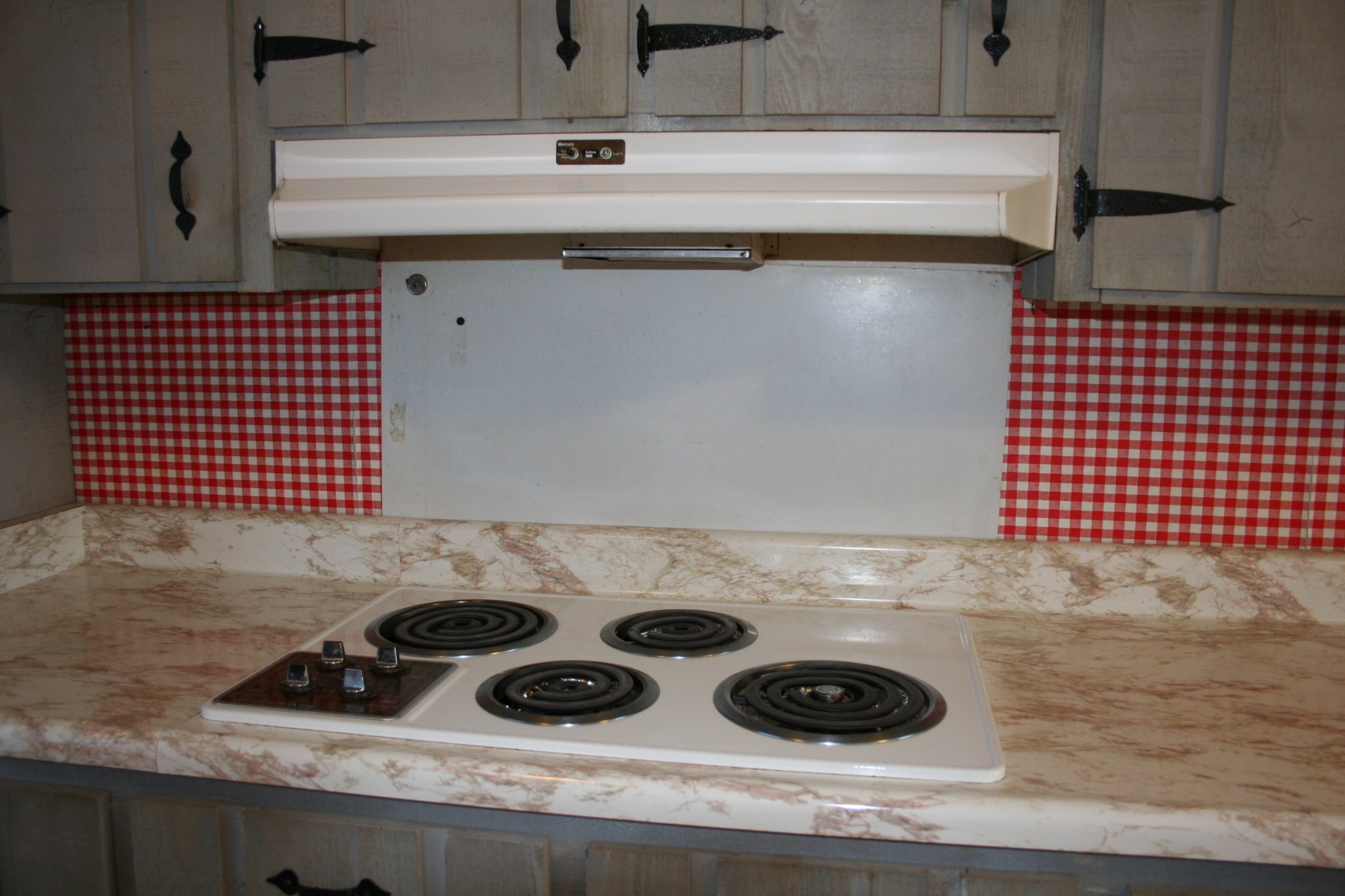 7080 Swift Road Greenbrier, TN 37073 - Photo 15 of 47 a kitchen with a sink a stove and cabinets