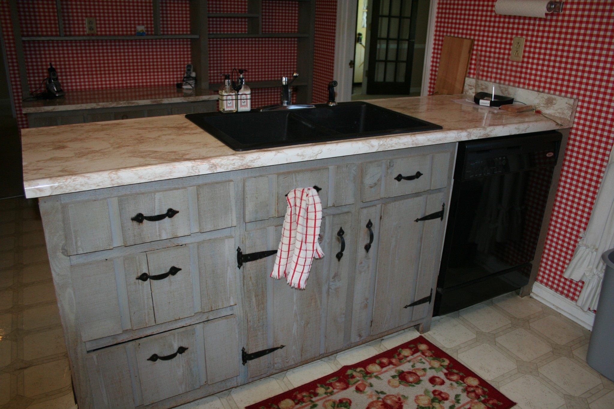 7080 Swift Road Greenbrier, TN 37073 - Photo 16 of 47 a kitchen with a sink and cabinets