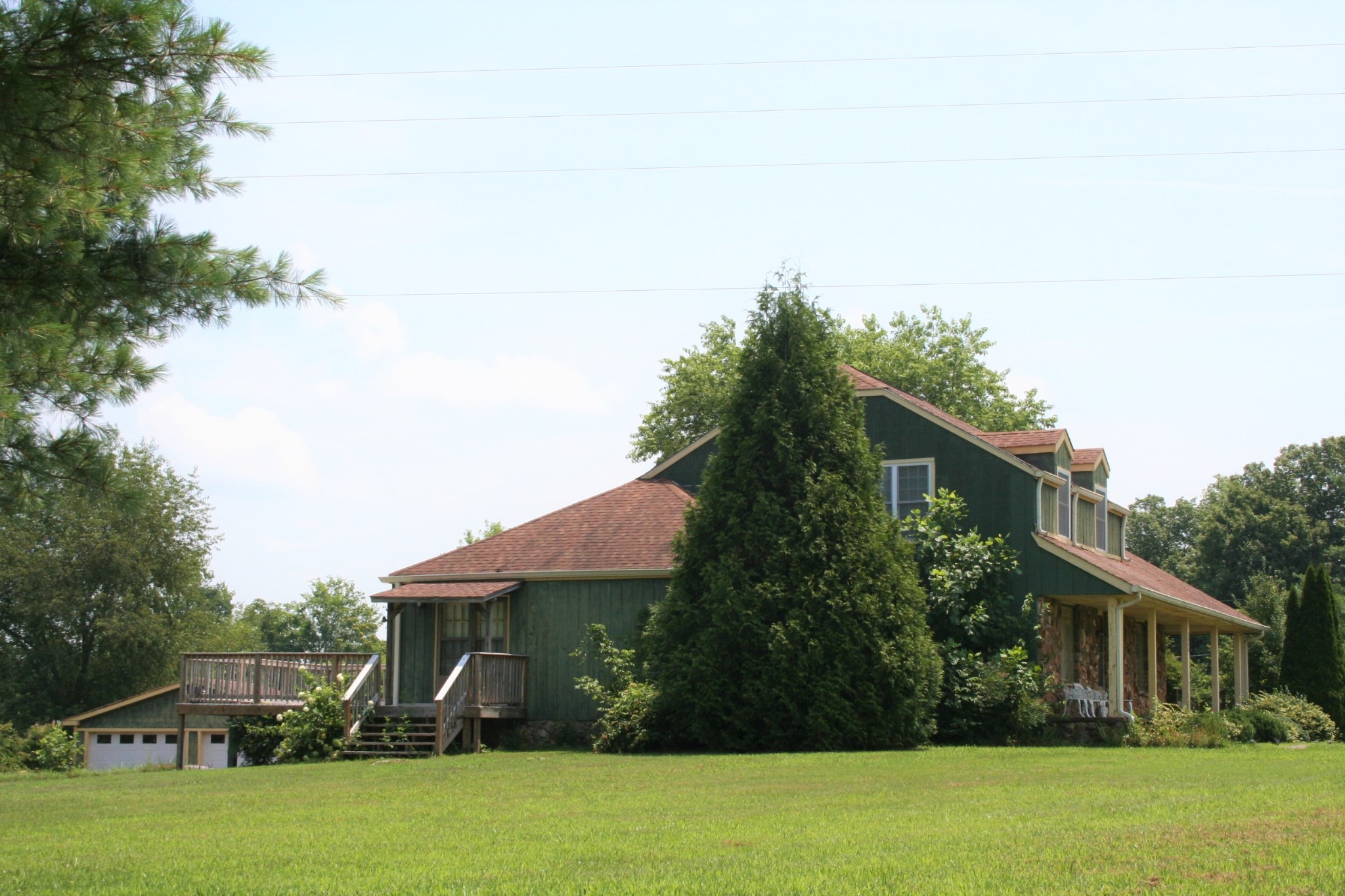 7080 Swift Road Greenbrier, TN 37073 - Photo 2 of 47 a front view of a house with garden