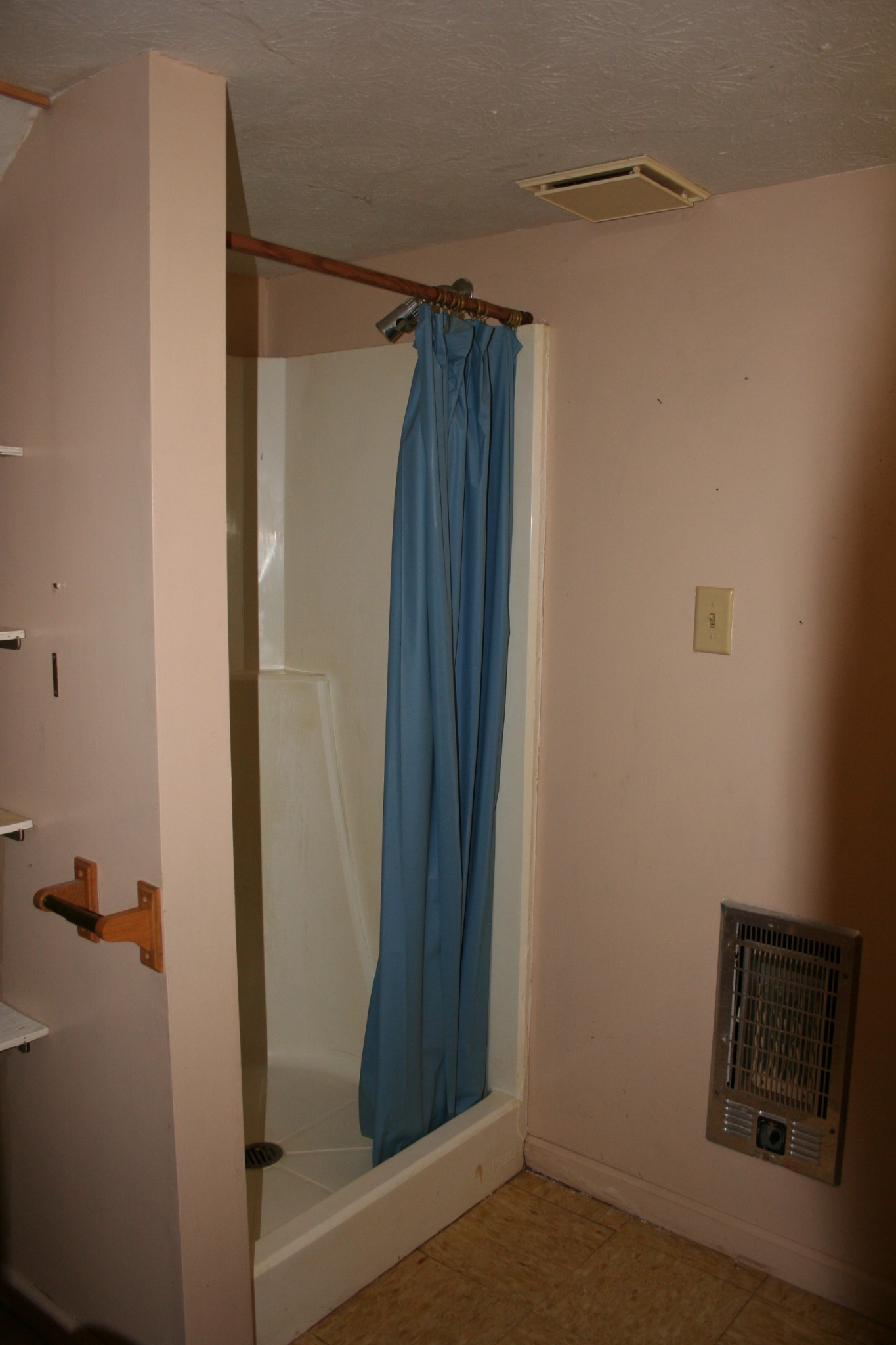 7080 Swift Road Greenbrier, TN 37073 - Photo 36 of 47 a bathroom with a shower and a door
