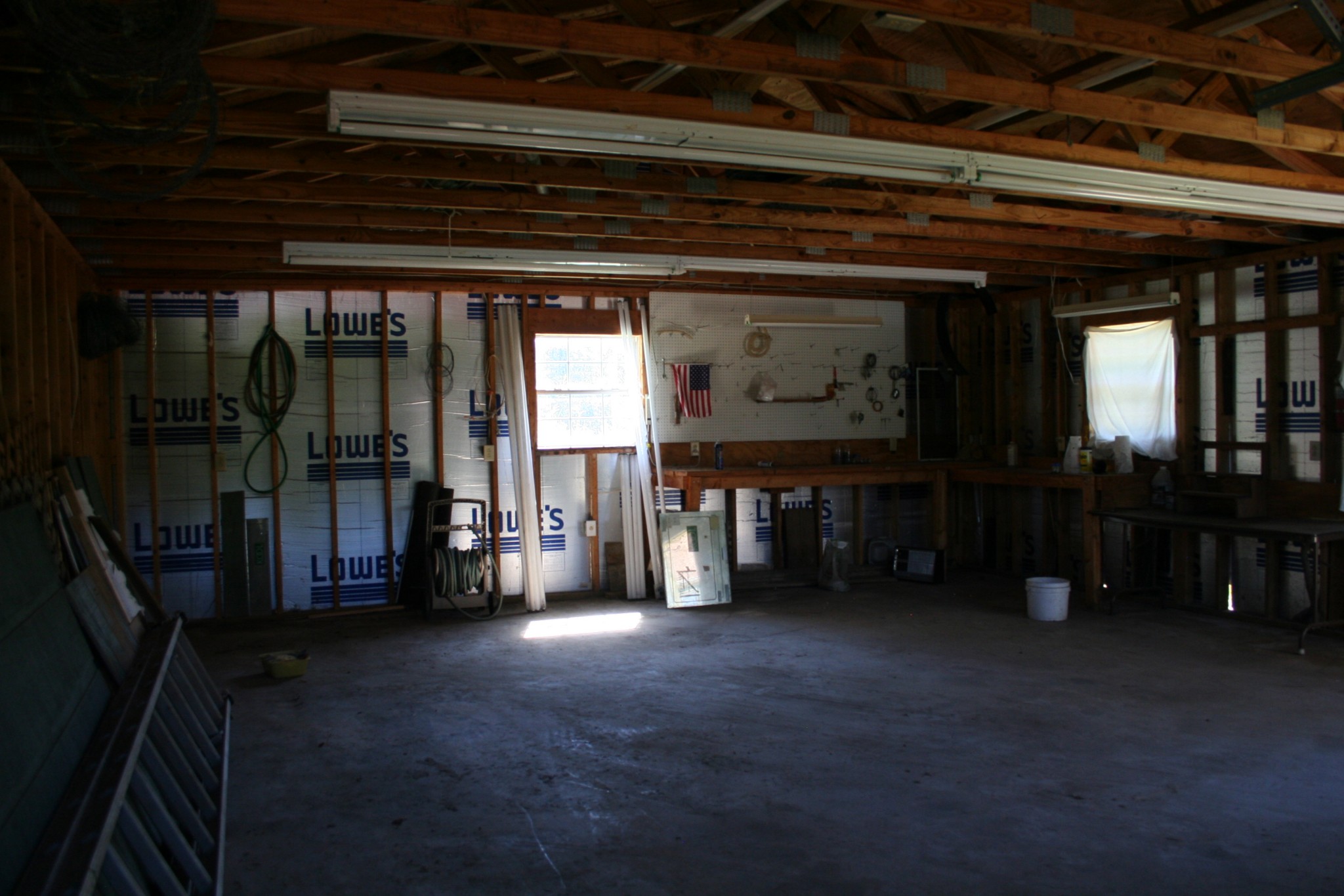 7080 Swift Road Greenbrier, TN 37073 - Photo 44 of 47 a view of empty room with wooden floor and windows