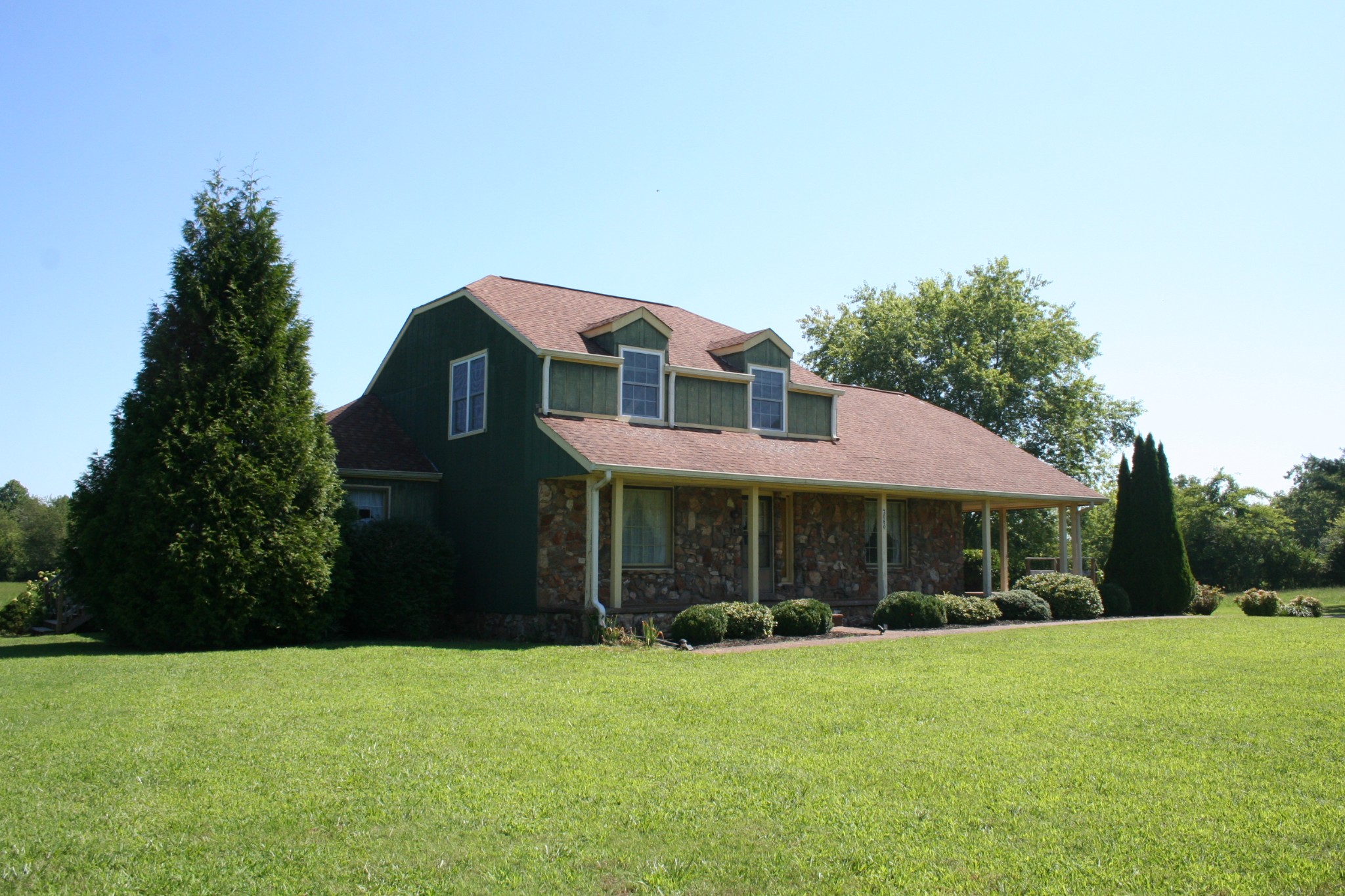 7080 Swift Road Greenbrier, TN 37073 - Photo 45 of 47 a front view of a house with a yard