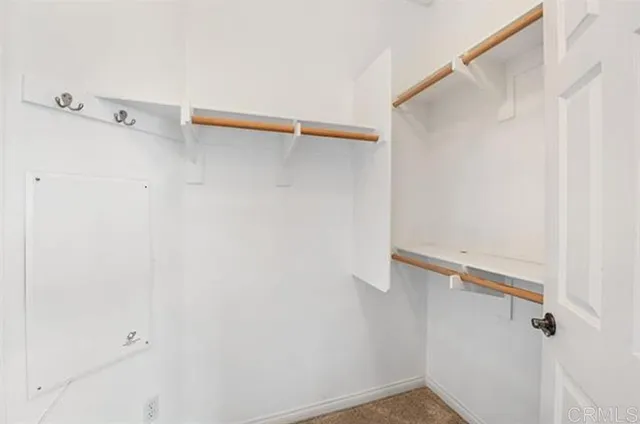 a view of small space with racks on the wall