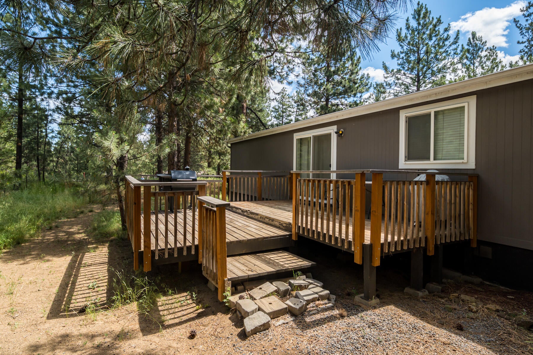 60477 Pima Road Bend, OR 97702 - Photo 6 of 25 Backyard with large deck